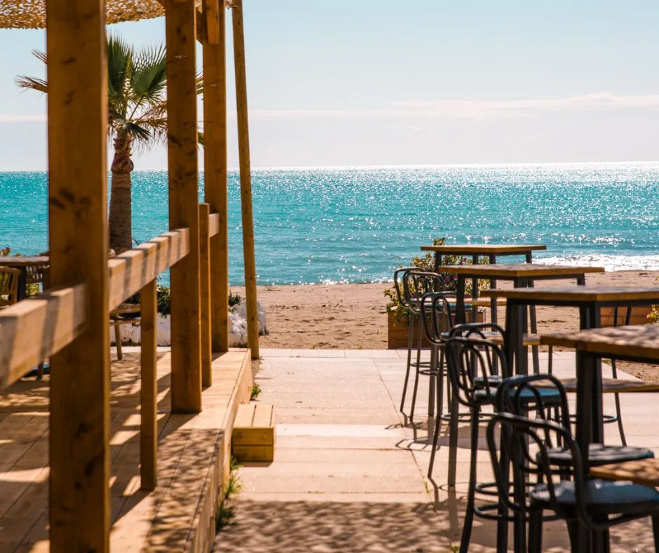 Beachfront chiringuito tables by the Mediterranean in Fuengirola
